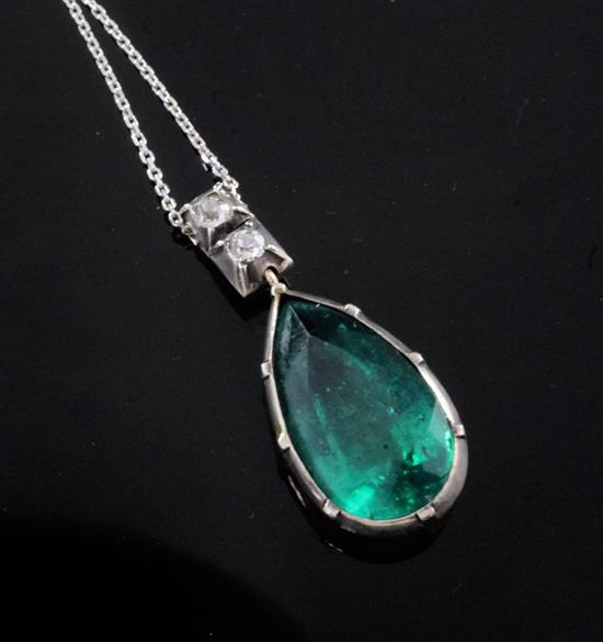 A late 19th/early 20th century gold and silver, emerald and diamond set drop pendant, on a later 18ct white gold chain,